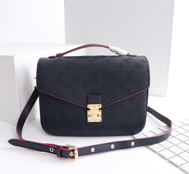 Louis Vuitton Métis Clutch Code: M40780