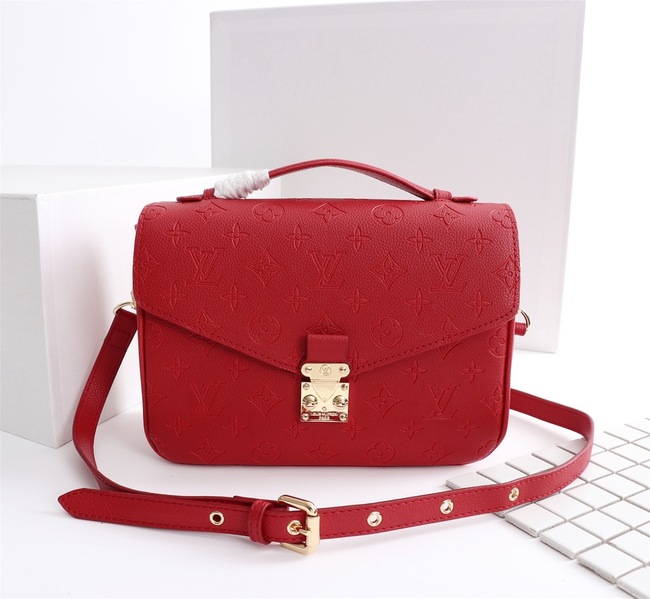 Louis Vuitton Métis Clutch Code: M40780
