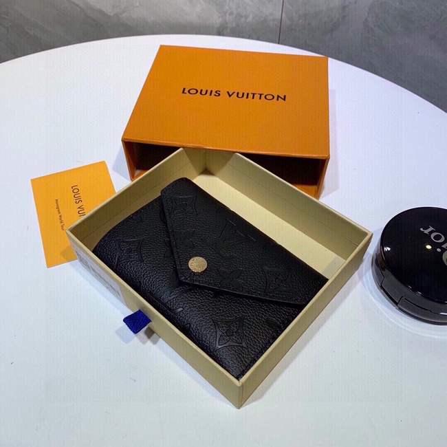 Louis Vuitton Embossed Leather Clutch