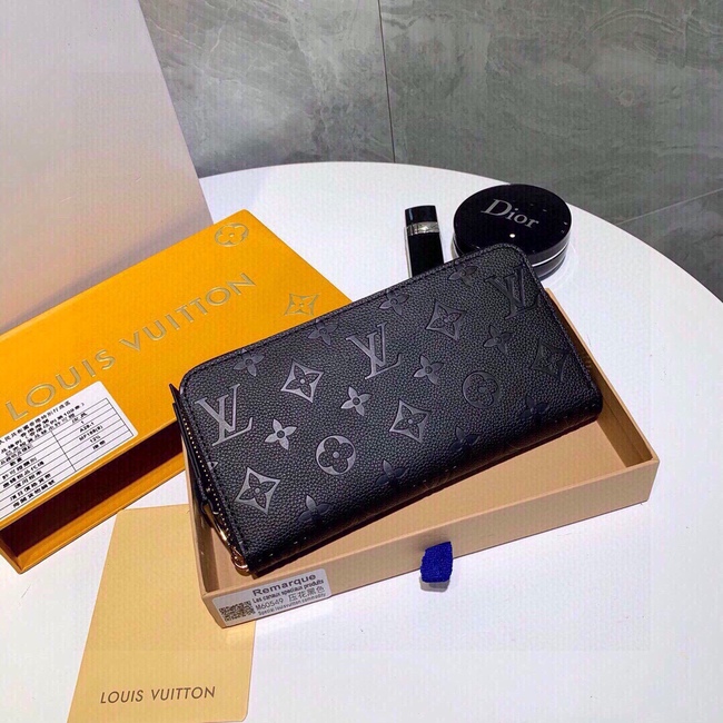 Louis Vuitton Leather Embossed Clutch