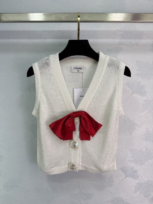 Chanel Knit Vest with Red Bow and Rhinestone Buttons for a Sophisticated Look