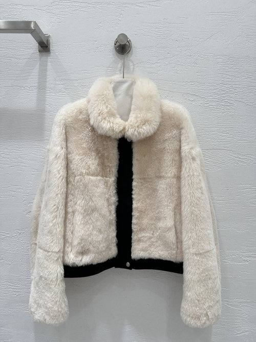 Yves Saint Laurent Chic Imported Tuscan Fur Leather Jacket with a Contrasting Design