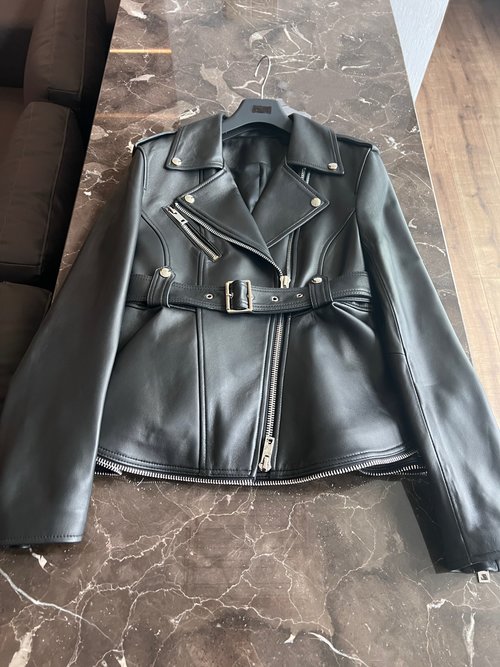 Chanel Stylish Unisex Leather Jacket with Custom Hardware and Thread Design