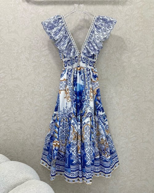 Ami Printed Back-Tie Dress with V-Neck and Flared Sleeves