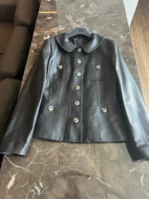 Chanel Leather Suit with Classic Design and Customized Hardware