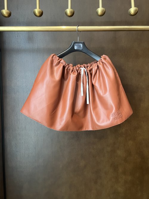 Miu Miu Classic Leather Skirt with Sweet and Cool Aesthetic, All-match and Stylish