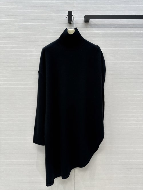 Alaia Irregularly Cut Wool Knit Blouse with Lazy and Elegant Style