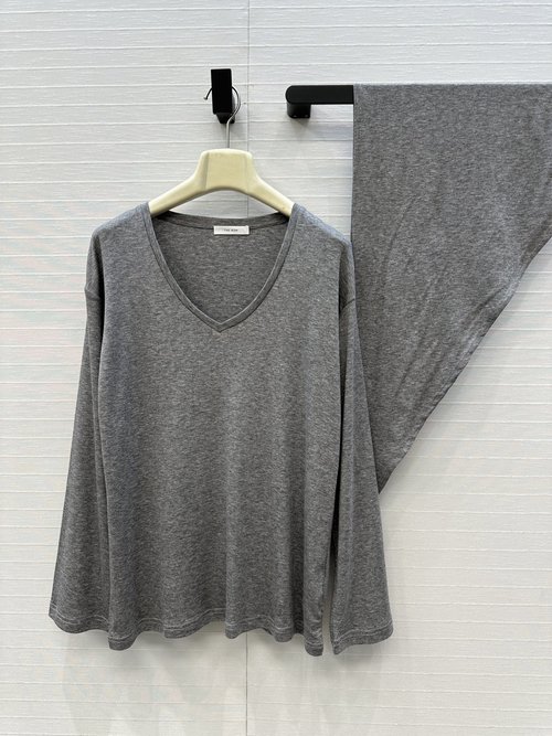 The Row Exclusive Premiere: Row Style Tassel Shawl for Layered Elegance