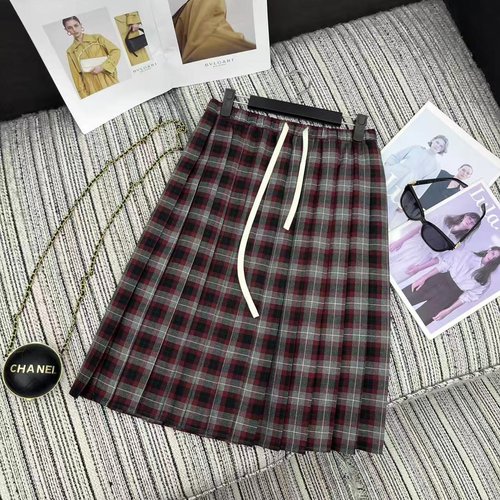 Miu Miu Vintage Checked Wool Shirt and Pleated Skirt Set with a Unique Design