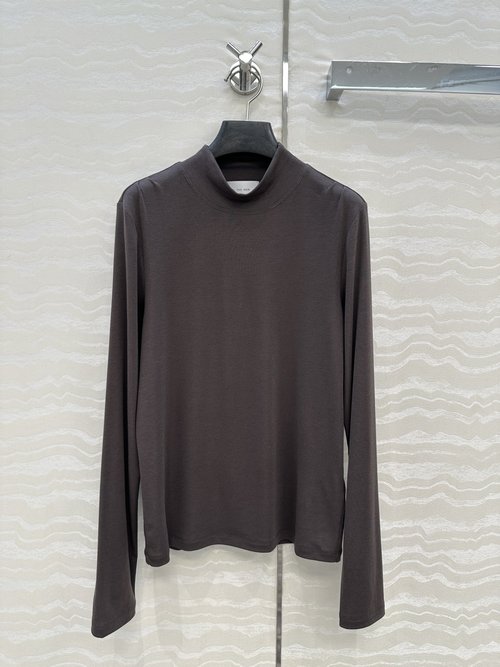 The Row Slimming Turtleneck Top with Collarbone Pleats in Exclusive Row Style