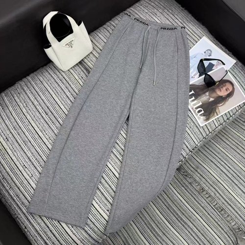 Prada Elastic-Waist Curved Jeans with Triangle Pocket