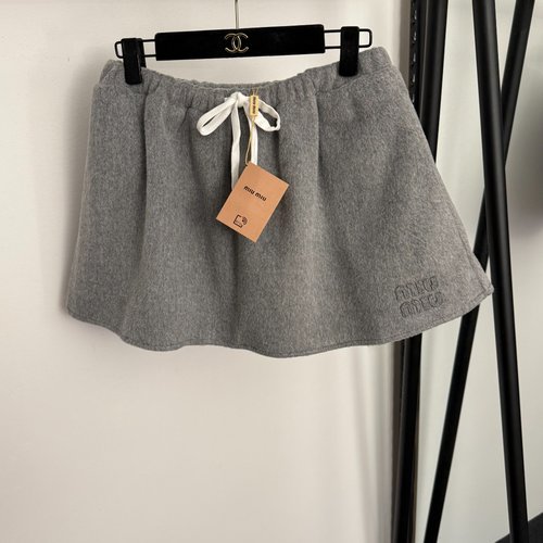 Miu Miu Elegant Logo-Appliqué A-Line Wool Skirt with Safety Shorts Lining
