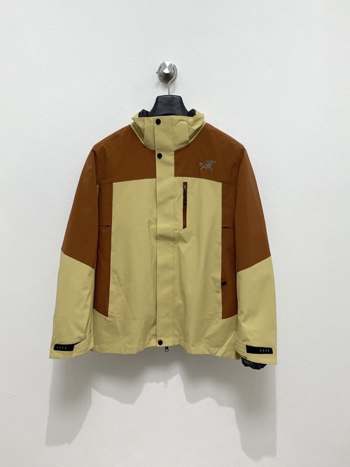 ArcTeryx Detachable Down Jacket with a Classic Logo