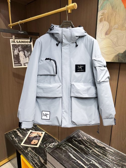 ArcTeryx 90-Down Filled Jacket with Logo and Plaid Design